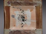 une image représentant une petite assiette sur laquelle figure l'image d'un oiseau