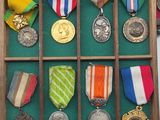 a display case with medals and medals in it