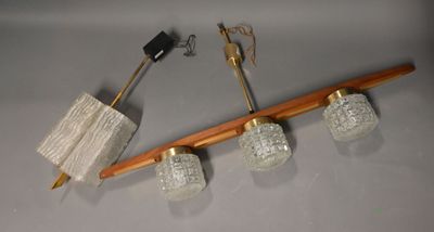 a toothbrush, toothpaste holder, and toothbrush holder on a table