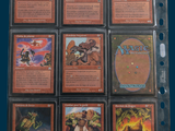a lot of cards that are in a plastic holder