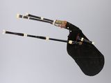 a bagpipe that is flying in the air