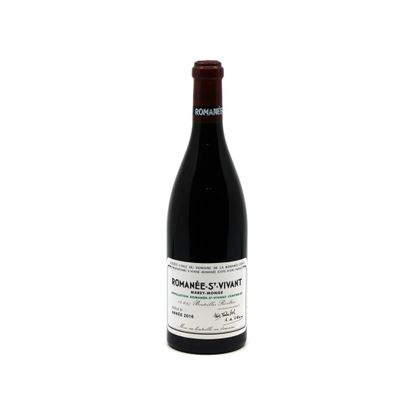 a bottle of wine that is sitting on a table