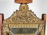 a mirror that is sitting on a stand in a room
