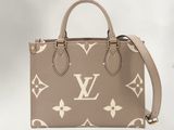 Sac à main Louis Vuitton en cuir beige à motif Monogramme, avec bandoulière
