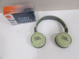 the jbl headphones are sitting on the table next to the box
