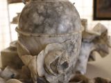a vase that is sitting on a table next to other items