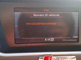 a picture of a car ' s dashboard showing the information on the display