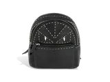 the small black bag has white stitching on it