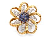 une broche en forme de fleur, en saphir et diamants, signée Van Cleef