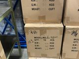 several boxes are stacked on top of each other in a warehouse
