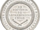 an image of a silver coin with a picture of a baseball bat on it