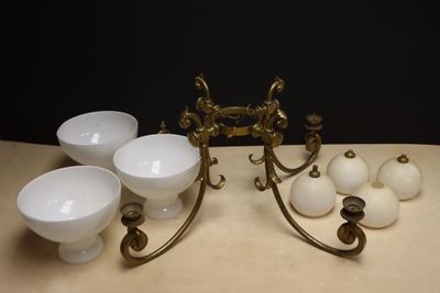 four bowls and a candle holder on a table