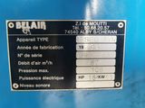 an image of a close up of a sign on a blue machine