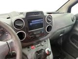 a dashboard of a car with a steering wheel and dashboard controls