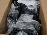 a cardboard box with a bunch of items inside of it