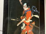 une image représentant un livre sur lequel figure l'illustration d'un homme en costume