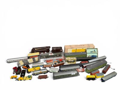a lot of toy trains on a white surface