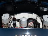 a close up view of a car engine with its hood open