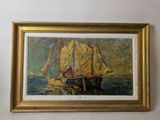 a picture of a painting of a sailboat in a gold frame