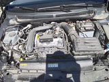 the engine of a car with its hood open and the hood open