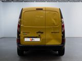 the back of a yellow van is parked in a white room