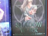 two books on a shelf with a pentagram