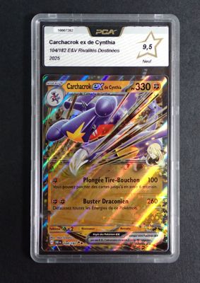 a close up of a card in a plastic case on a table