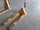 two pallets that are sitting in a warehouse