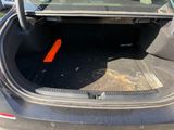 a trunk of a car with the door open