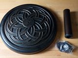 an image of a wooden table with a fan and other items on it