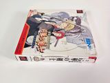 a picture of a box of anime cards on a table