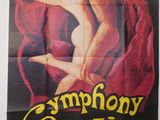 une vieille affiche de cinéma représentant une femme en robe rouge