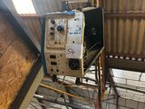 a machine that is hanging from the ceiling of a building