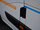 a white van with a blue stripe on the side of it