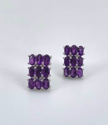 Boucles d'oreilles en argent serties d'un pavage d'améthyste…
