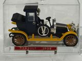 a small model of a car in a clear box