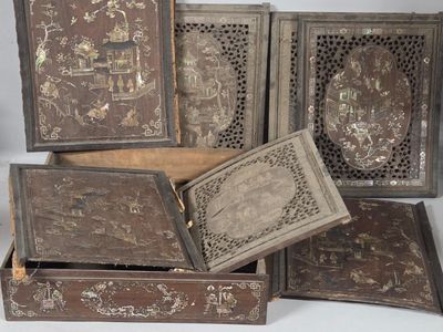 several wooden boxes with decorative designs are stacked on top of each other