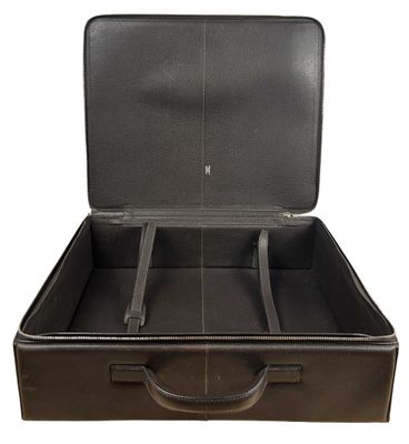an image of a black leather suitcase with a handle and two compartments