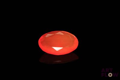 an image of a red diamond on a black surface
