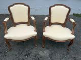 paire de chaises anciennes à accoudoirs rembourrés