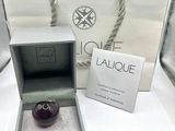 a box with a ring inside of it and a box with a ring inside of it