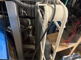 an image of a kitchen with a lot of clutter on the counter