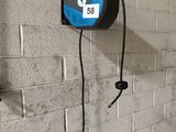 an image of a wall mounted air conditioner on a brick wall