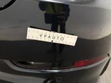 a sticker on the back of a car that says vauto