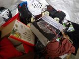 a pile of luggage sitting on top of a bed