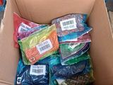 a cardboard box filled with assorted items for sale