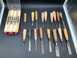 a lot of tools that are sitting on a table