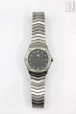 a close up of a watch on a white surface with a white background