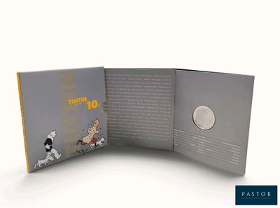 un livre sur lequel figure l'image d'un chien et d'un chat