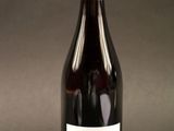 a bottle of wine that is sitting on a table
